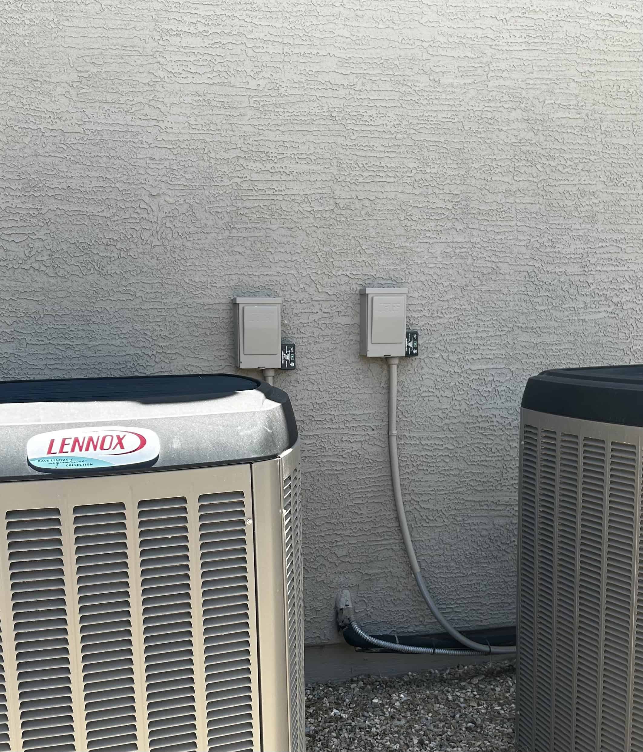 Lennox variable speed heat pumps installed by magic touch mechanical, mesa az with surge protectors from Ditek wired into the fused electrical disconnect box