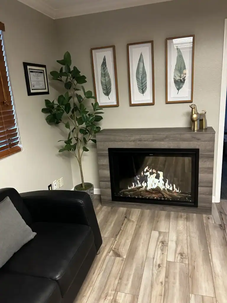 modern flames orion traditional electric fireplace in driftwood grey woodtone cabinet at the fire place mesa az